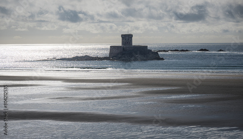 The Napoleonic era fortification of La Rocco Tower (or Fort Gordon) in St Ouen's Bay on the island of Jersey, Channel Islands photo