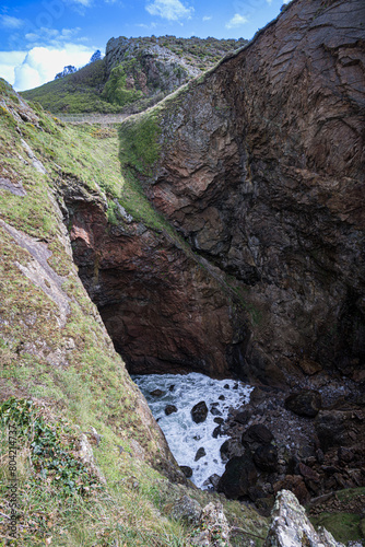 The famous "Devil's Hole" on the island of Jersey, Channel Islands