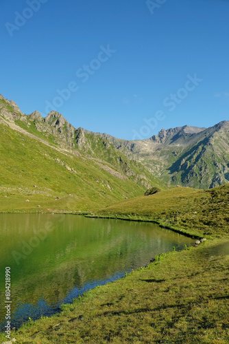 landscape with picturesque mountain lake  natural background. Beautiful Summer Mountains landscape. freedom  adventure  privacy  unity with wild nature  tourism and travel concept.