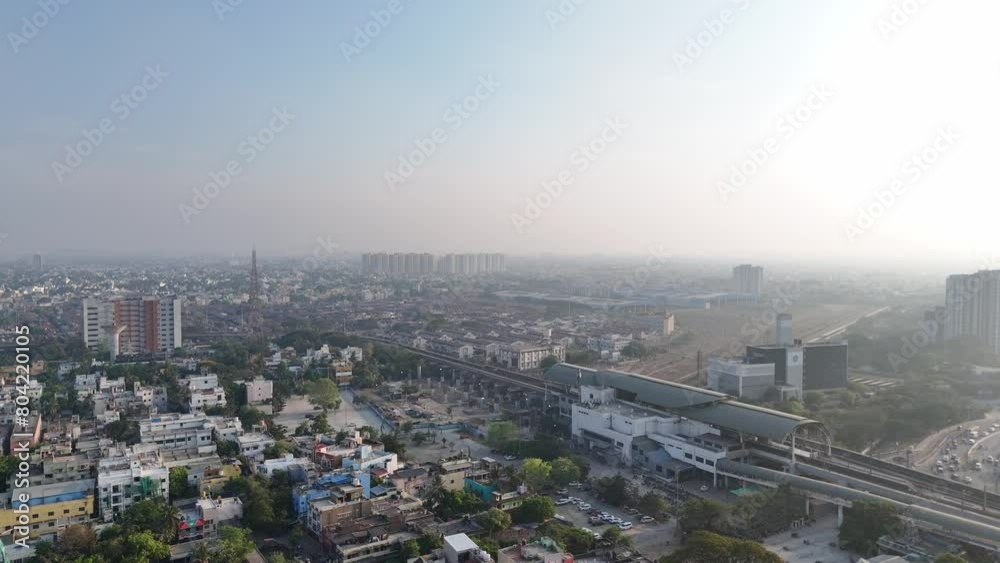 A captivating drone shot of Chennai, highlighting the city's bustling streets and towering skyscrapers. A captivating drone shot of Chennai, highlighting the city's bustling streets and towering skyscrapers.