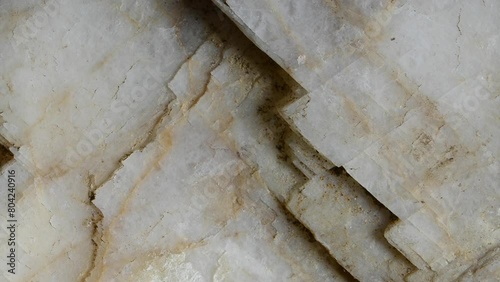 Calcite crystals sample rotating slowly against a black background	 photo