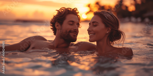 Enamoured Couple Enjoying a Romantic Sunset Soak in a Hot Tub