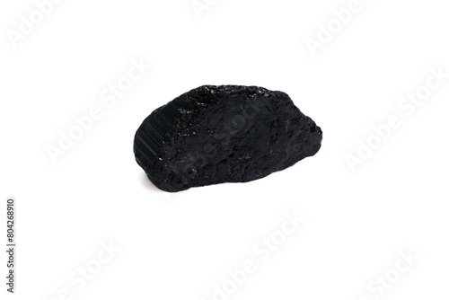 natural black tourmaline gem stone on the white background © Galka3250