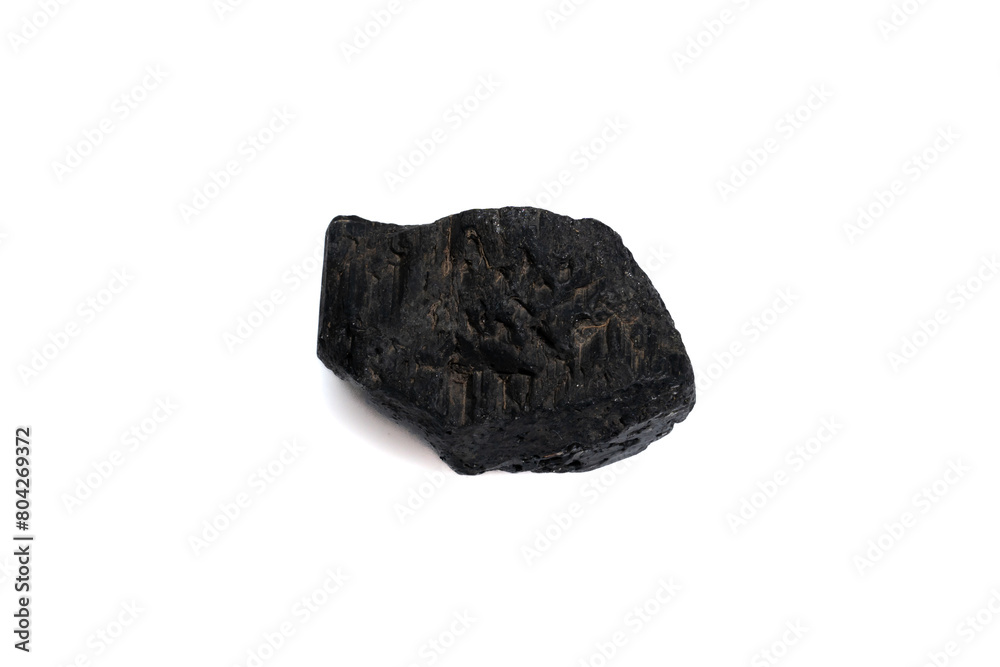 natural black tourmaline gem stone on the white background natural black tourmaline gem stone on the white background