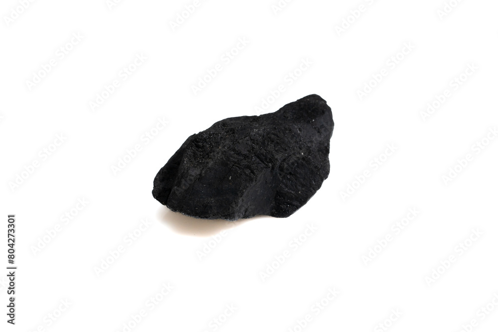 natural black tourmaline gem stone on the white background