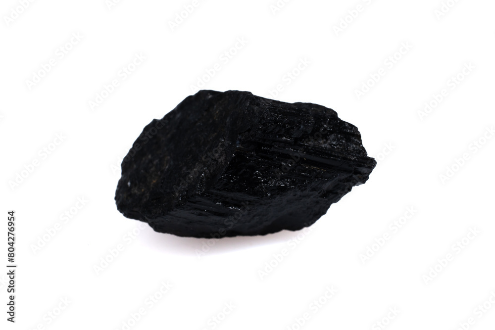 natural black tourmaline gem stone on the white background