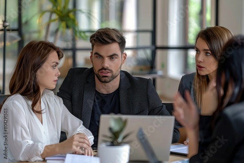 Businessman having meeting with colleagues at office