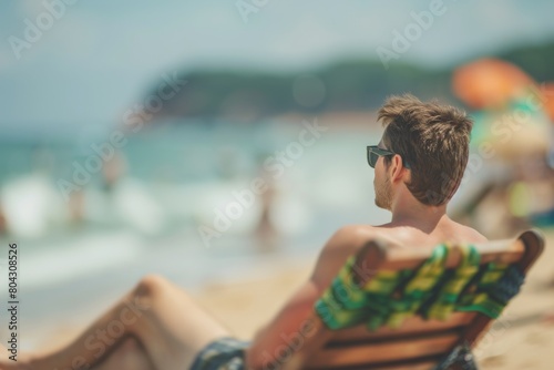 Man relaxing at the beach