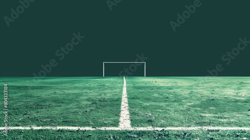A soccer field with a white line down the middle photo