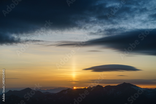 Sunrise at the summit of the mountain 