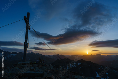 Sunrise at the summit of the mountain 