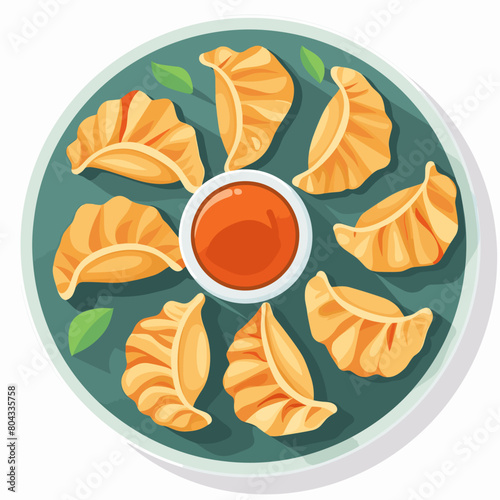A plate of Guotie Peking Wor tip Guo tie Potstick with a dipping sauce