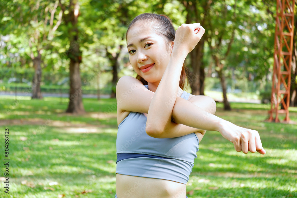 Beautiful young woman exercising in the park Exercise concept for health. Beautiful young woman exercising in the park Exercise concept for health.