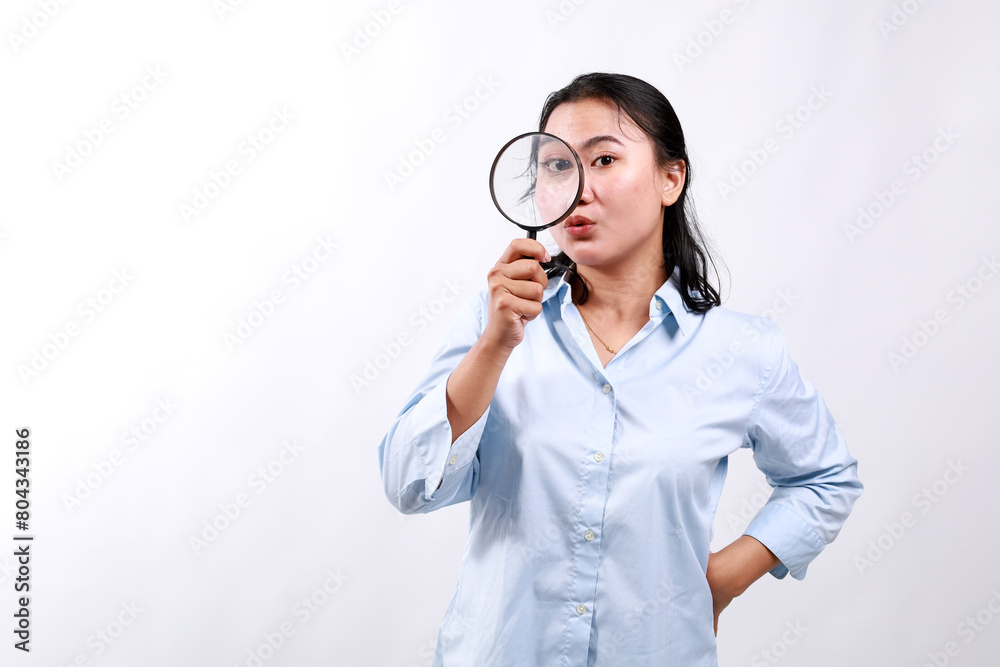 Surprised funny asian woman searching for something, found product, looking through magnifying glass amazed and impressed. Small business owners, women entrepreneurs concept. Surprised funny asian woman searching for something, found product, looking through magnifying glass amazed and impressed. Small business owners, women entrepreneurs concept.