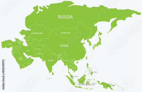 Green political map of ASIA with white country borders and name tags using orthographic projection on light blue background