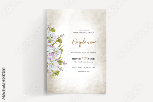 WEDDING INVITATION FRAME WITH FLOWER DECORATIONS WITH FRESH LEAVES © IGNA