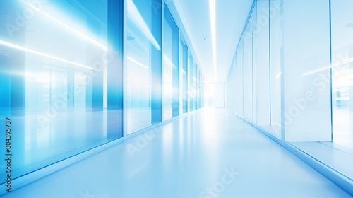Empty white corridor with glass walls. Blurred motion image in blue and white tones. Medical facility concept. Design for healthcare posters and presentations. Wide angle perspective with copy space.