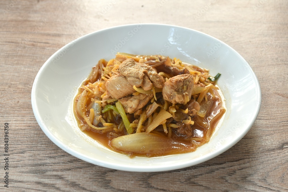 stir fried chicken with slice ginger and black ear mushroom on plate stir fried chicken with slice ginger and black ear mushroom on plate