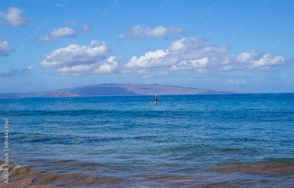 Paddleboarder off Maui with Big Island in Distance Paddleboarder off Maui with Big Island in Distance