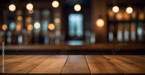 Empty wooden table top with blurred bar  cafe  restaurant background for product placement. Product background