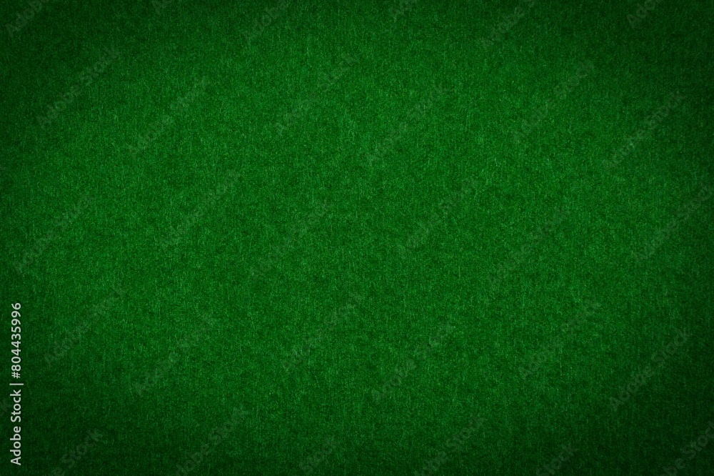 Fototapeta premium green paper with vignette a background or texture 