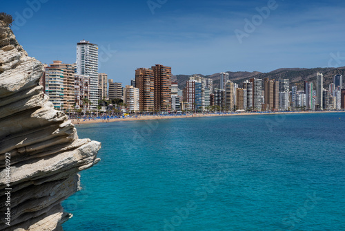 panorama of the Benidorm city (Spanish Manhattan) surrounded by rocks seen from the viewpoint - Balcó del Mediterrani. View also of the city beach - Platja de Llevant (Levante) photo