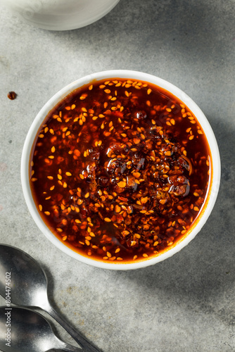 Fototapeta Naklejka Na Ścianę i Meble -  Spicy Hot Chili Crisp Oil
