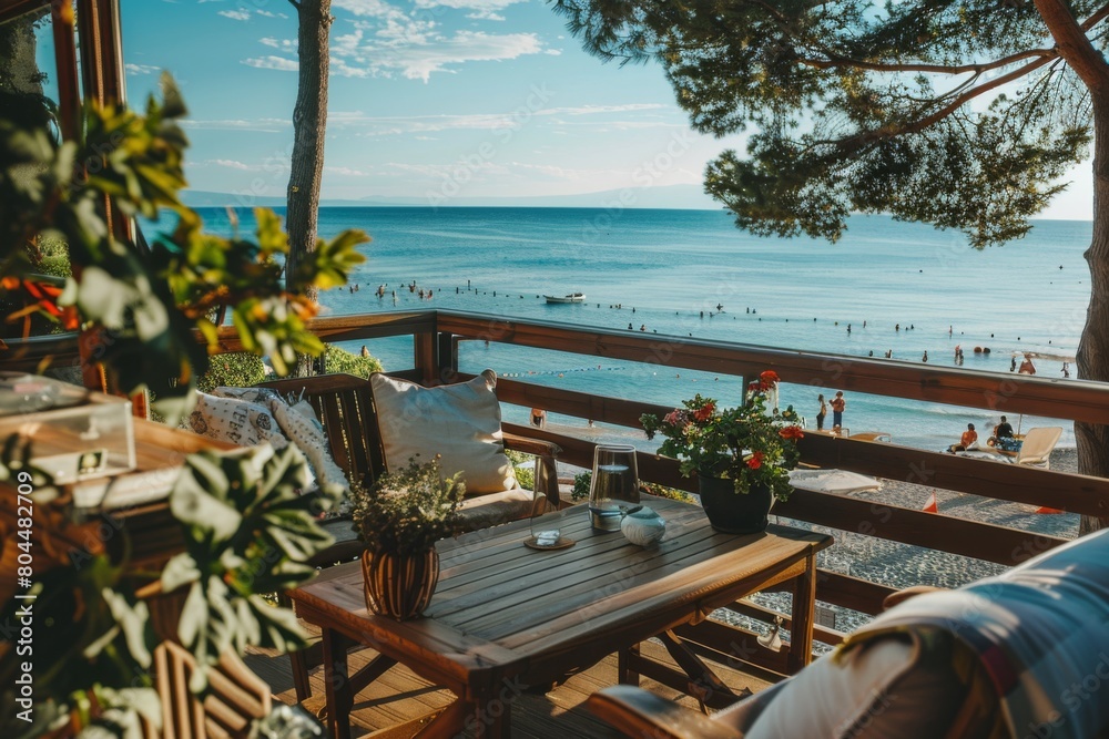 Idyllic Beachside Café Terrace Overlooking Serene Ocean Horizon