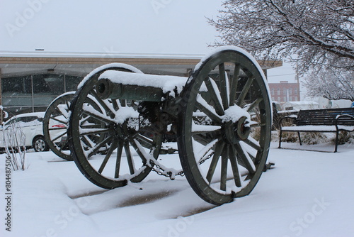 old Artillery  cannon in the snow outdoor sky