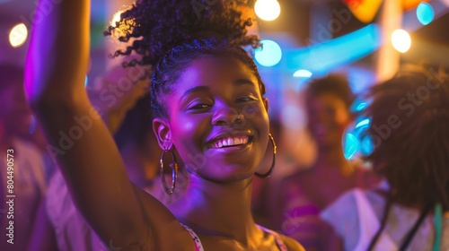 Beautiful black woman dancing at a party
