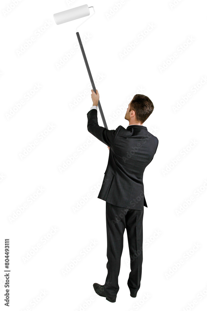 A man in a business suit holding up a roller brush against a white background, representing a concept of improvement or change A man in a business suit holding up a roller brush against a white background, representing a concept of improvement or change