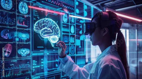 A female scientist wearing a VR headset examines a 3D model of a brain. photo