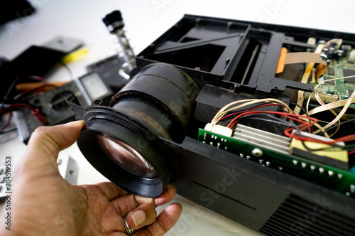 Video and multimedia projector open for maintenance with led lamp photo