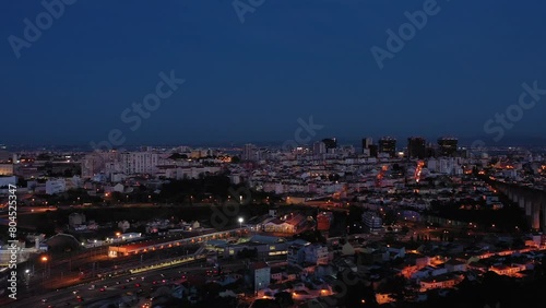 Wallpaper Mural Illuminated Lisbon Skyline at Night. Portugal. Aerial View. Drone Moves Sideways Torontodigital.ca