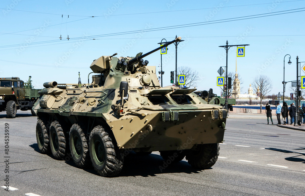 An armored personnel carrier BTR-82AM, against the backdrop of the Peter and Paul Fortress, goes to the rehearsal of the May 9 parade. Saint Petersburg. Russia An armored personnel carrier BTR-82AM, against the backdrop of the Peter and Paul Fortress, goes to the rehearsal of the May 9 parade. Saint Petersburg. Russia