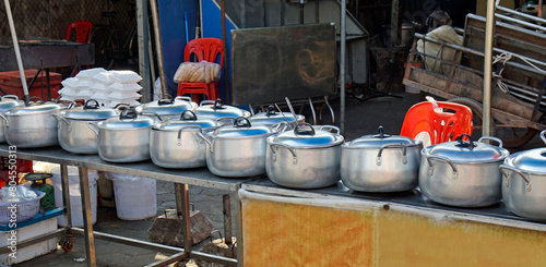 Obraz na płótnie steet kitchen with many pots