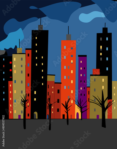 A nighttime cityscape is depicted with a variety of colorful high-rise buildings lit by windows against a dark blue sky with clouds. Bare trees in silhouette are interspersed among the buildings