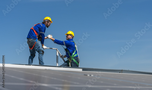 Wallpaper Mural Solar roof engineer men working on factory roof  Torontodigital.ca