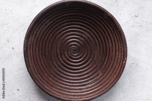 Overhead view of a banneton basket for bread making, Top view of a wood proofing basket