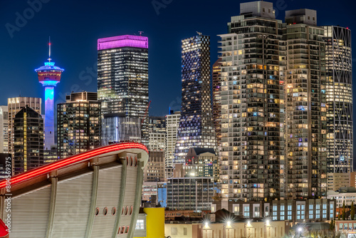 Calgary Tower and some of the modern skyscrapers in downtown Calgary at night