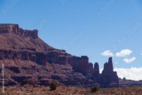 Red cliff and butte landscapes in Utah Castle Valley with blue skies in spring 