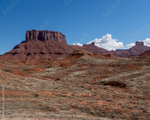 Red cliff and butte landscapes in Utah Castle Valley with blue skies in spring 