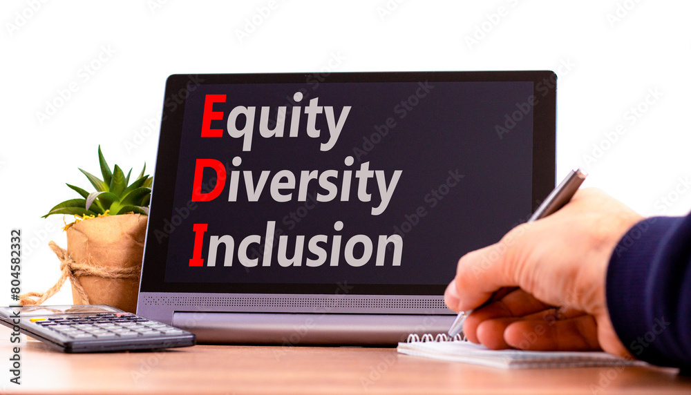 EDI equity diversity inclusion symbol. Concept words EDI equity diversity inclusion on beautiful black tablet. Beautiful white background. Business EDI equity diversity inclusion concept. Copy space. EDI equity diversity inclusion symbol. Concept words EDI equity diversity inclusion on beautiful black tablet. Beautiful white background. Business EDI equity diversity inclusion concept. Copy space.