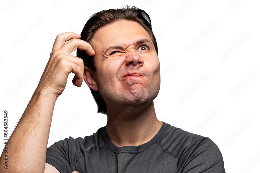 Young emotional pensive man portrait on white background