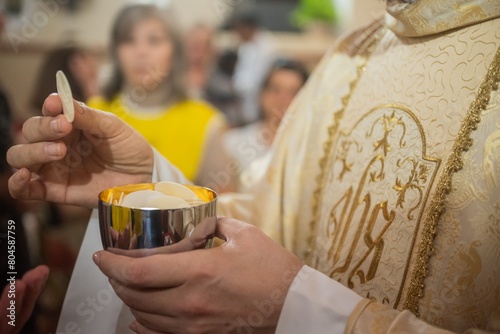 The holy host in the Eucharistic celebration in the Catholic Church.