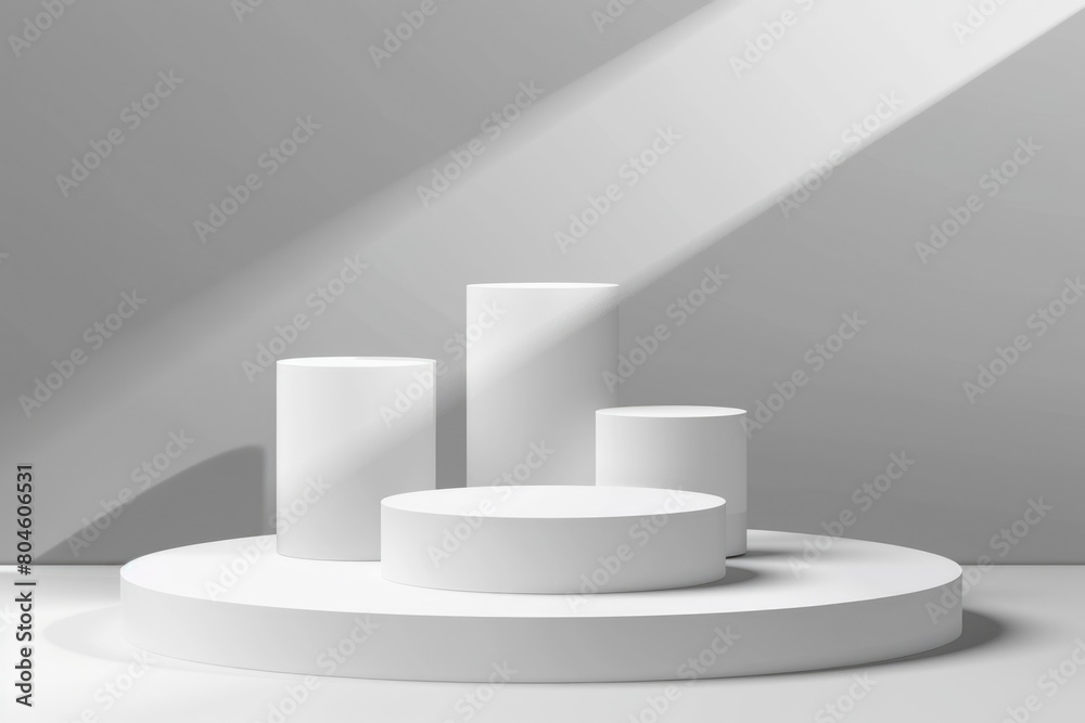 Three white pedestals on a white surface. Suitable for product displays Three white pedestals on a white surface. Suitable for product displays