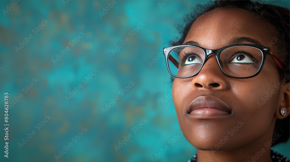 Stylish black woman with bright hair on a blue background Stylish black woman with bright hair on a blue background