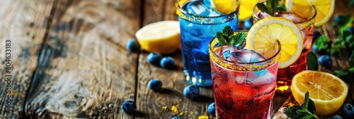 horizontal banner, National Day of Sweden, Swedish flag, citrus alcoholic cocktails with blueberries, lemon, mint and herbs, wooden background, copy space, free space for text photo