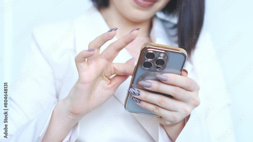 Woman is holding iphone15 pro on white background. Woman is holding iphone15 pro on white background.