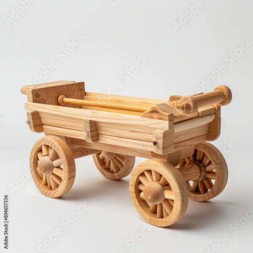 A wooden toy wagon with wheels on a white background